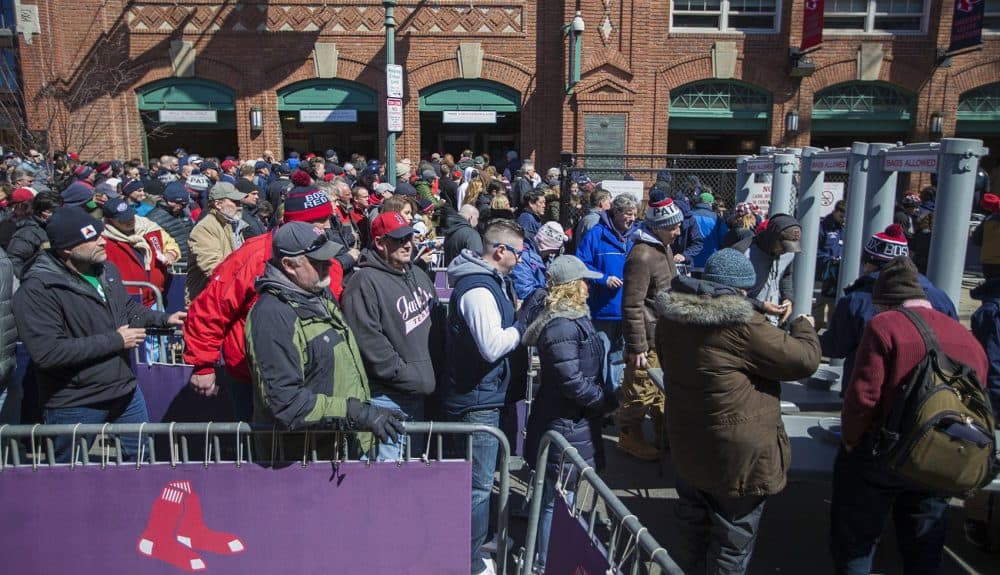 Red Sox fans file into the turnstiles on Yawkey Way on Opening Day. (Jesse Costa/WBUR)