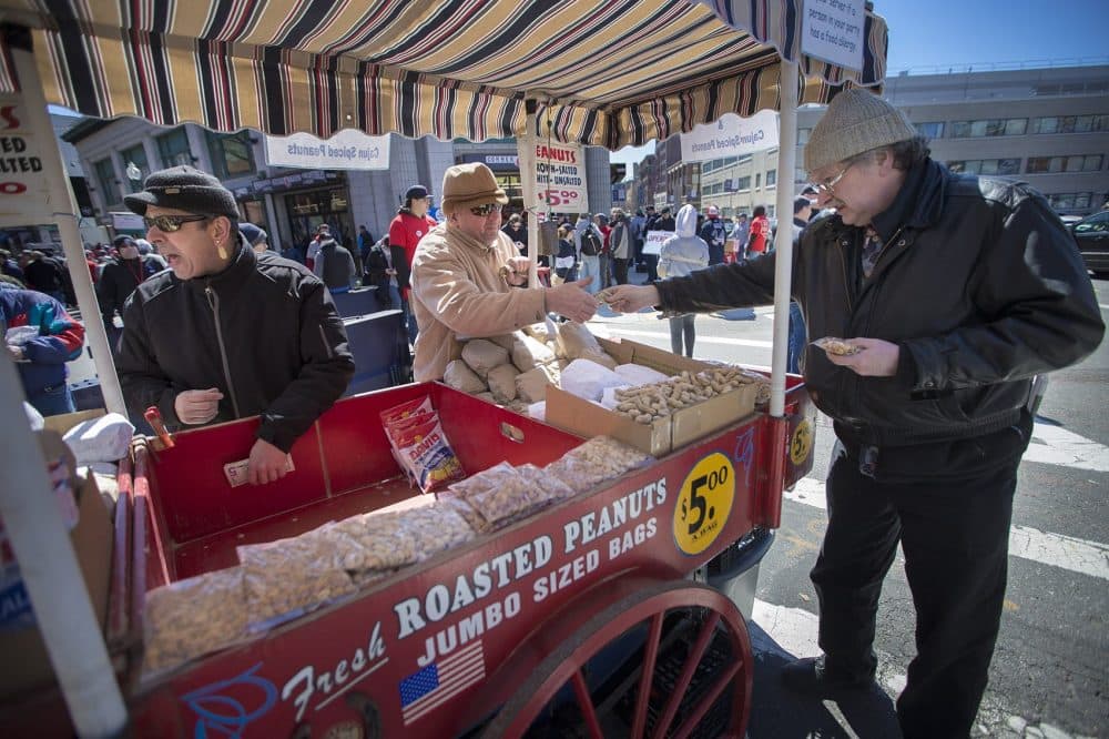 Peanut vendors on the corner of Brookline Avenue and Yawkey Way sell their snacks. (Jesse Costa/WBUR)