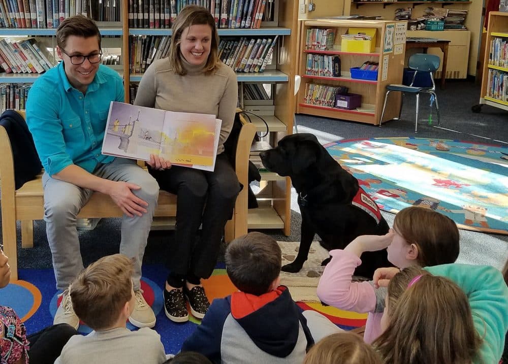 Patrick Downes and Jessica Kensky read their book at a recent school visit in Newton. (Courtesy of Candlewick Press)