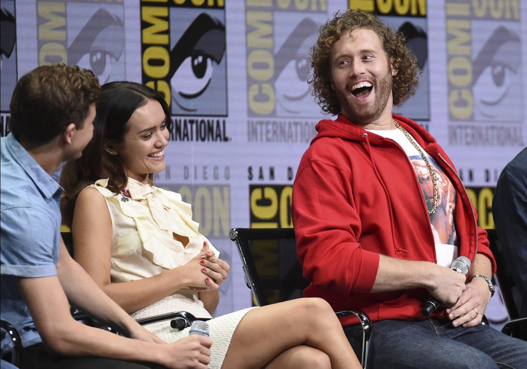 From left, Tye Sheridan, Olivia Cooke and T.J. Miller attend the Warner Bros. "Ready Player One" panel on day three of Comic-Con International on Saturday in 2017 in San Diego. (Richard Shotwell/Invision/AP)