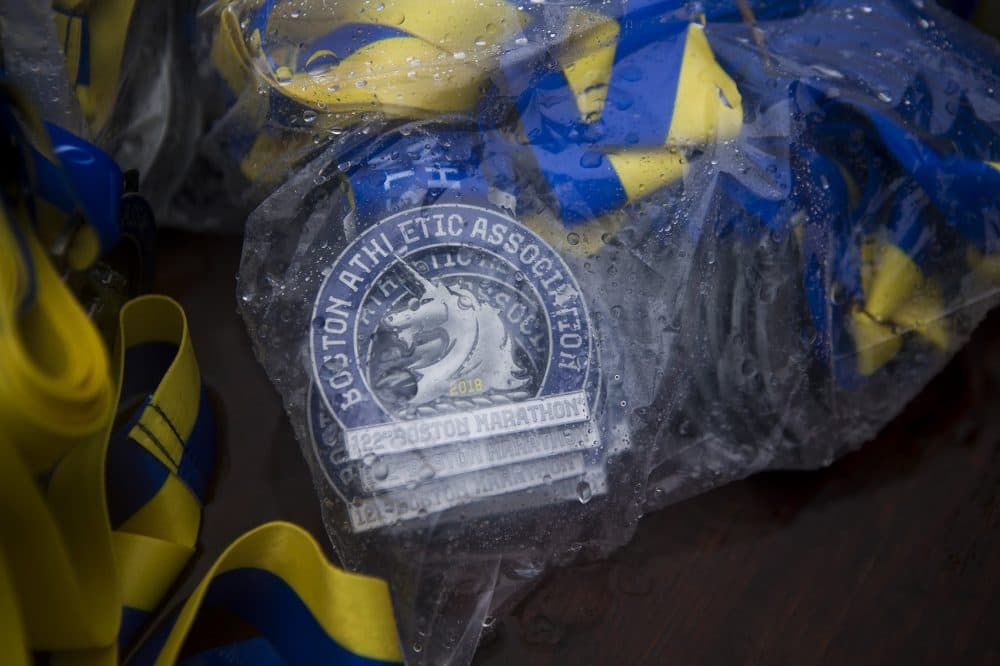 Rain-soaked bags of 2018 Boston Marathon medals (Jesse Costa/WBUR)