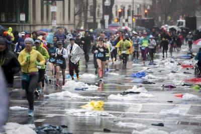 Over Those 26.2 Miles, Boston Marathon Runners Leave So Much Clothing Behind. Who Picks It Up?