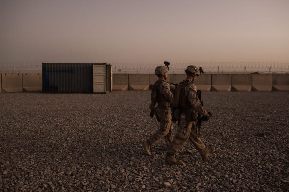 U.S. Marines walk to guard stations at Camp Shorab on Sept. 11, 2017 in Helmand Province, Afghanistan. (Andrew Renneisen/Getty Images)