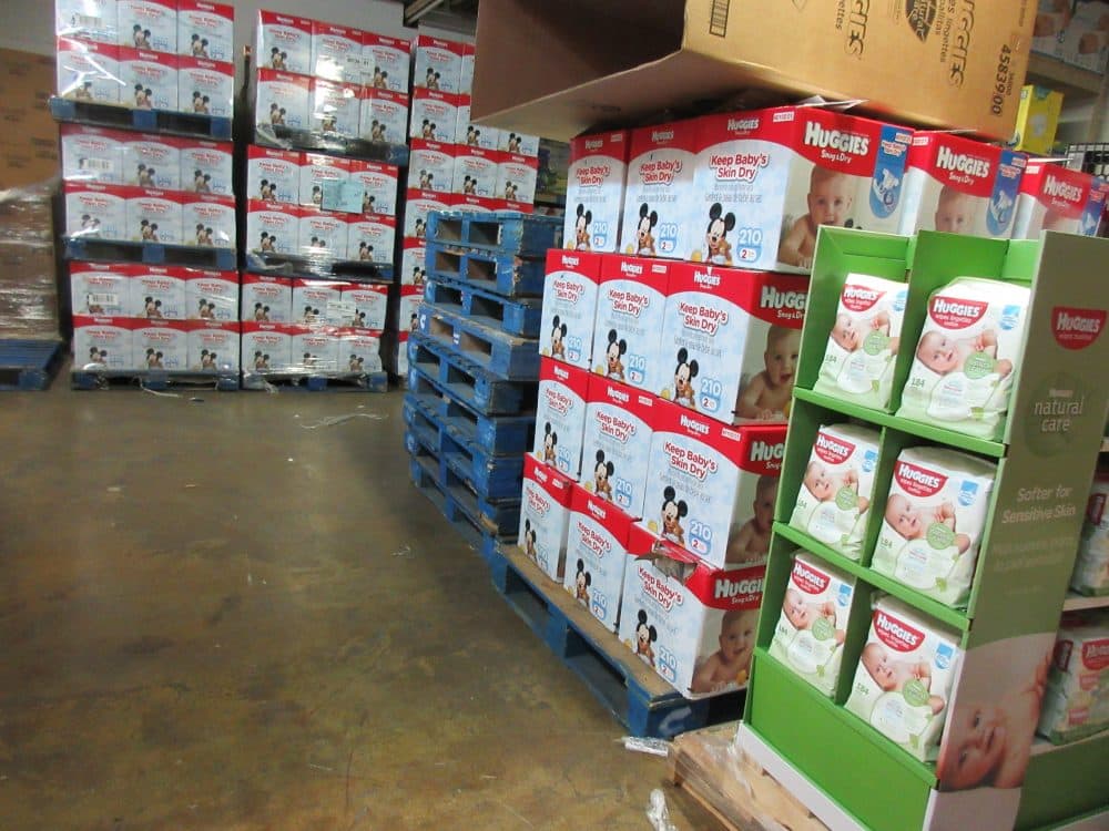 This Sept. 9, 2016 photo shows boxes of donated diapers stacked in a warehouse in North Haven, Conn. The National Diaper Bank Network, which operates the warehouse, distributes the diapers to agencies and community-based organizations like churches, which in turn provide them to families in need. (Beth J. Harpaz/AP)