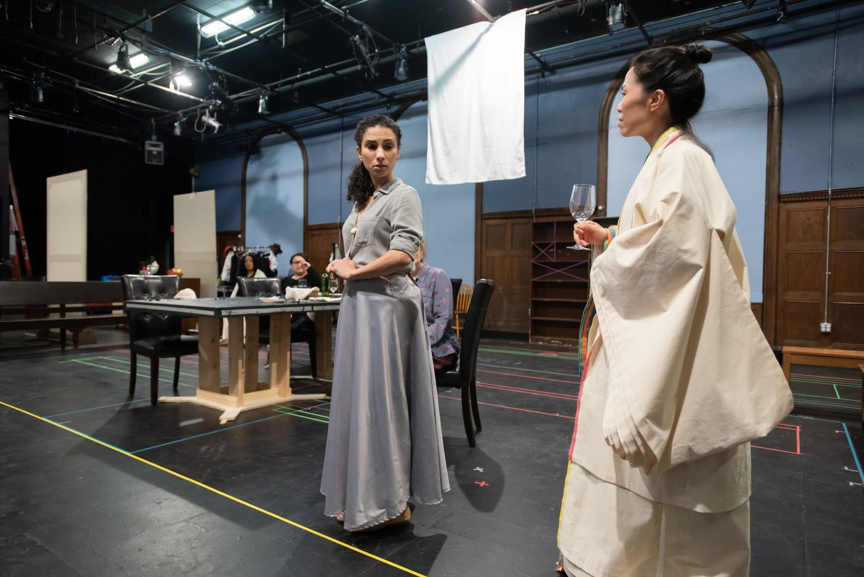 Elia Monte-Brown and Vanessa Kai rehearse "Top Girls." (Courtesy Mike Ritter/Huntington Theatre Company)