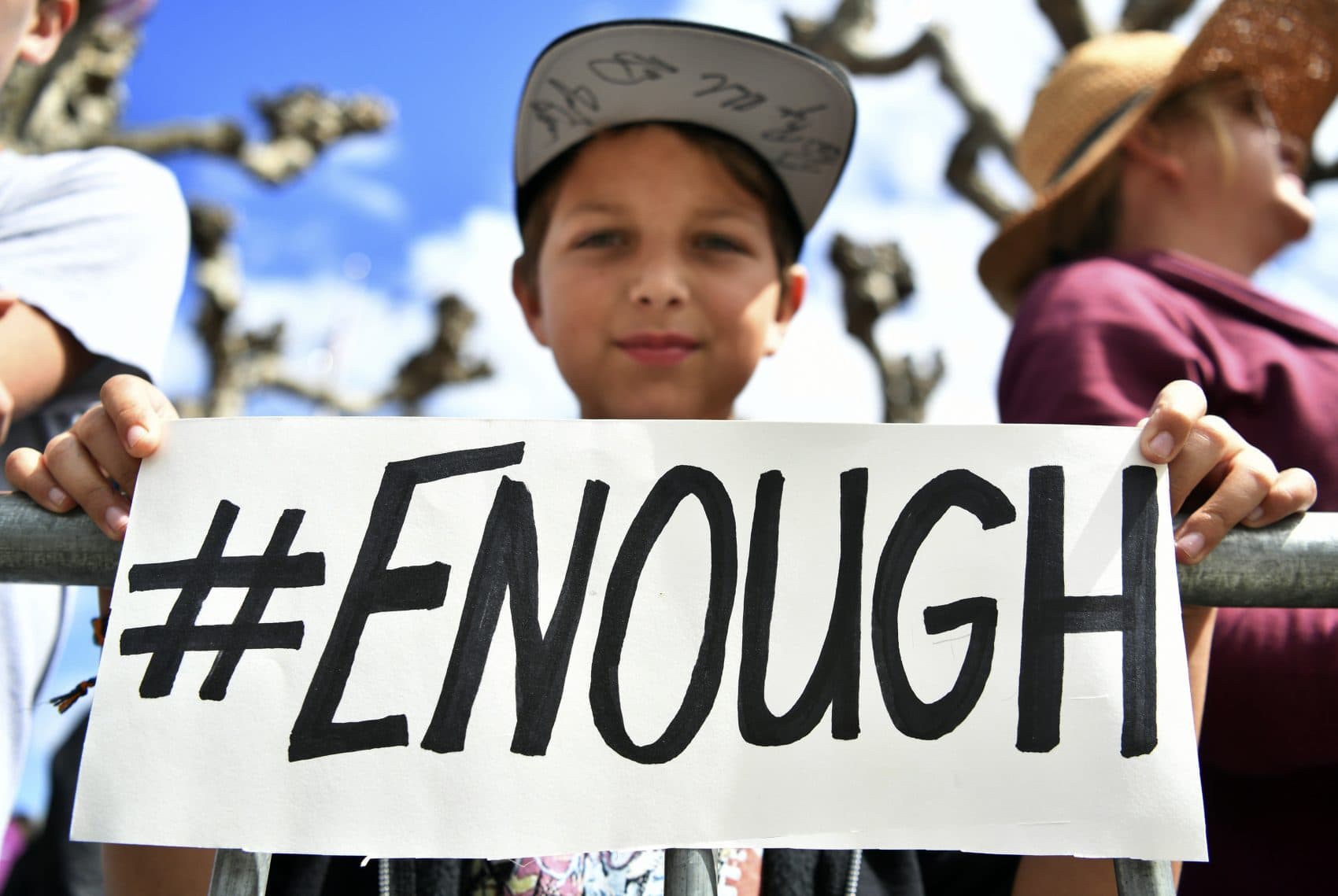 Zachary Chakin holds up a sign as crowds of people participate in the March for Our Lives rally in support of gun control, Saturday, March 24, 2018, in San Francisco. In a historic groundswell of youth activism, hundreds of thousands of teenagers and their supporters rallied across the U.S. against gun violence Saturday, vowing to transform fear and grief into a "vote-them-out" movement and tougher laws against weapons and ammo. (Josh Edelson/AP)