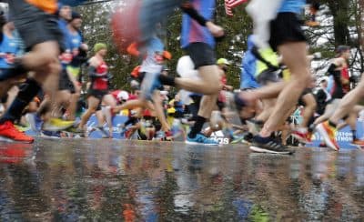 Boston Marathon Photos: Runners Persevere Through Rain And Wind