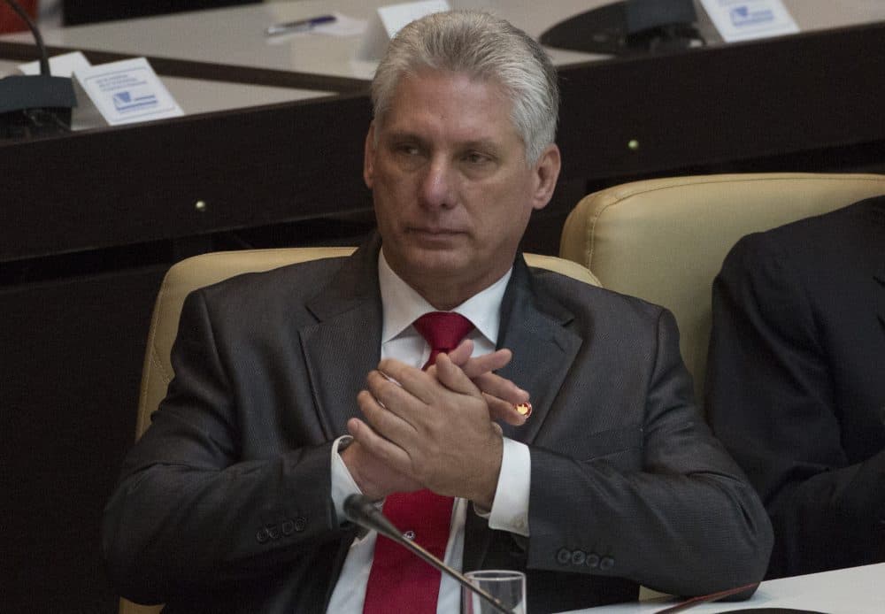 Cuba's new president Miguel Diaz-Canel applauds, after being elected as the island nation's new president, at the National Assembly in Havana, Cuba, Thursday, April 19, 2018. (Desmond Boylan/AP)