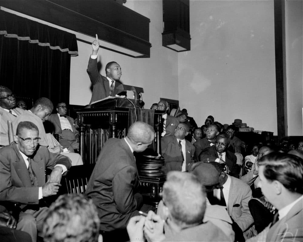 King speaks to an overflow crowd at the Holt Street Baptist Church. King, leader of the Montgomery bus boycott, was found guilty March 22, 1956, of conspiracy in the boycott. (Gene Herrick/AP)