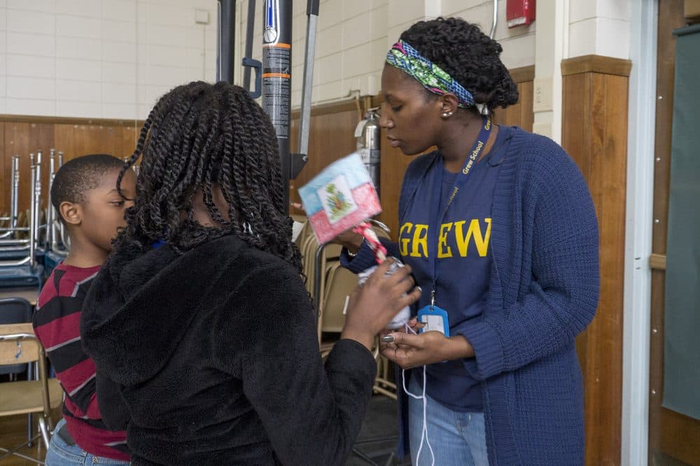 Teacher Chinelle Andrews (right) with students at the Grew &quot;acceleration academy.&quot; (Max Larkin/WBUR)