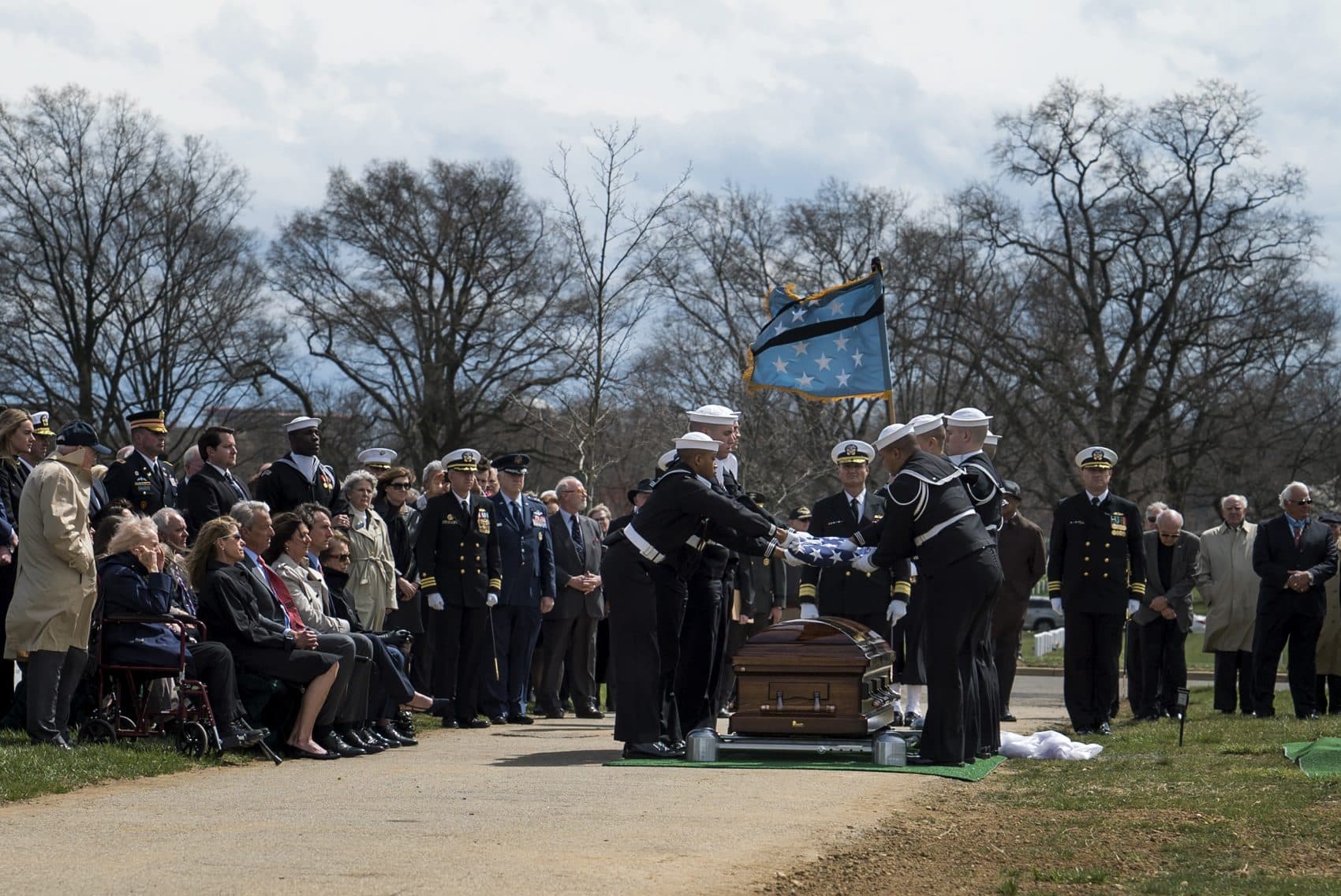 Navy Capt. Thomas Hudner Jr. is laid to rest at Arlington National Cemetery on April 4. Hudner was a naval aviator who was awarded Medal of Honor during the Korean War. (Eslah Attar/NPR)