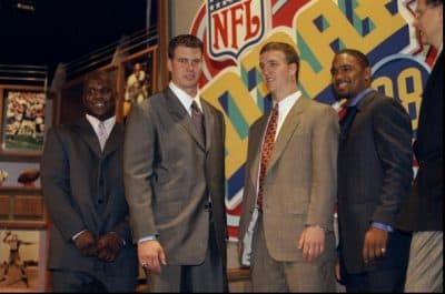 Running back Curtis Enis, defensive back Charles Woodson and quarterbacks Ryan Leaf and Peyton Manning stand together during the 1998 NFL draft. (Jamie Squire/Allsport)