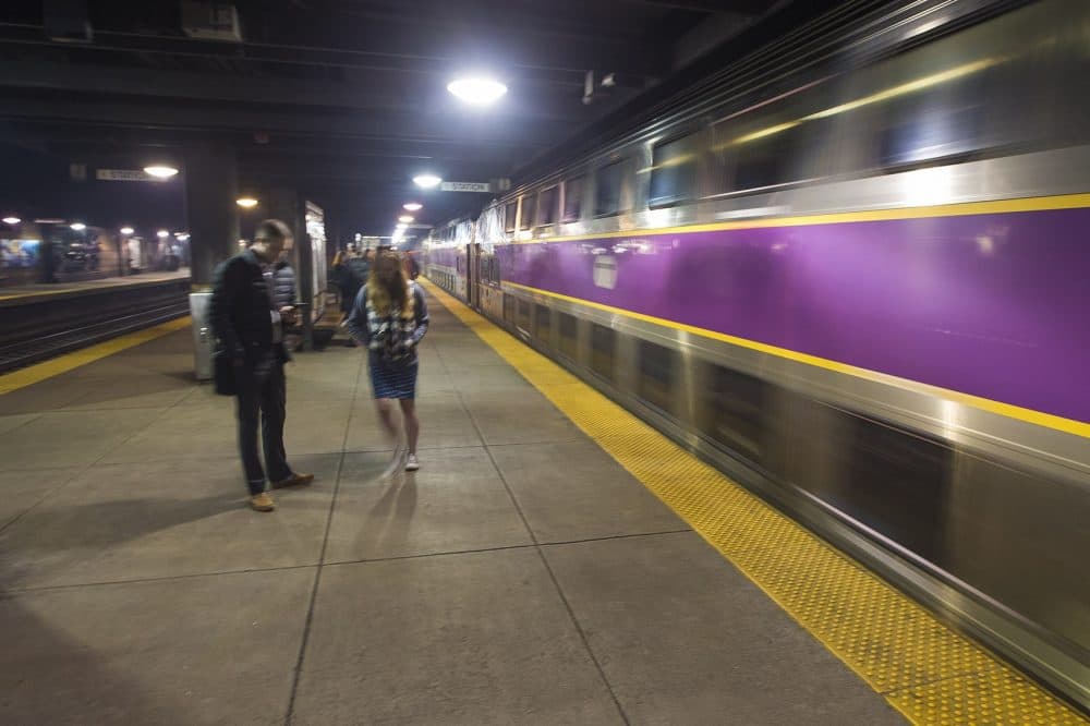 A commuter rail train arrives at Back Bay Station. (Jesse Costa/WBUR)
