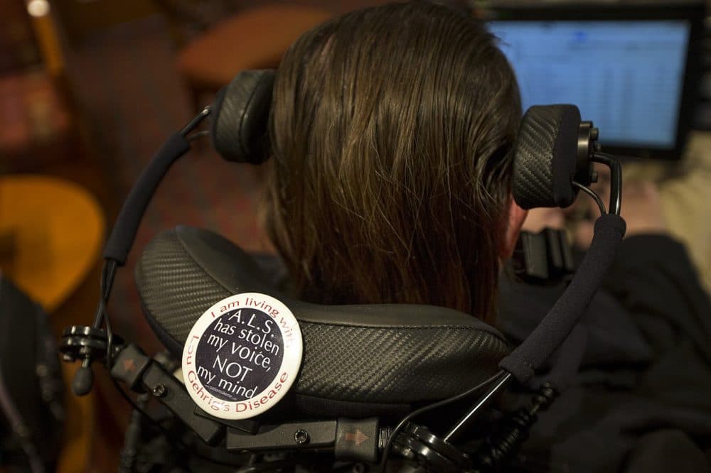 A button on the back of Steve Saling's wheelchair. (Jesse Costa/WBUR)
