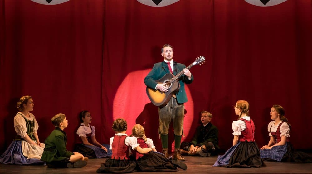 Mike McLean as Captain von Trapp and the von Trapp Family. (Courtesy Matthew Murphy)