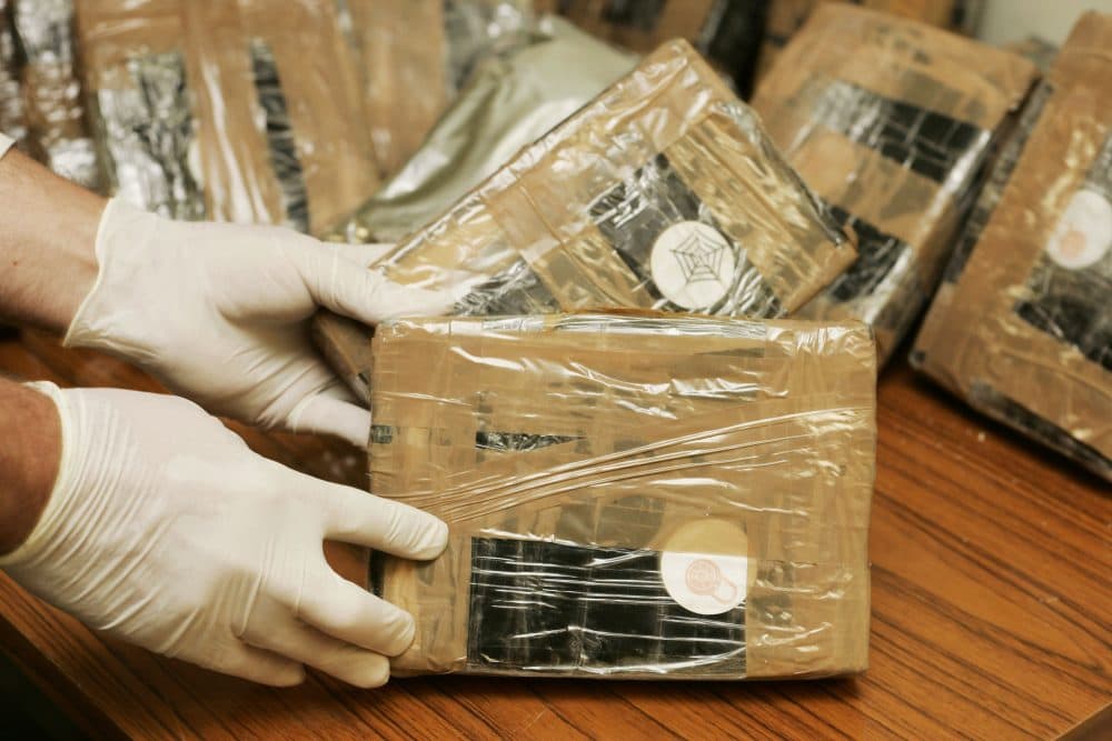 Confiscated bags containing cocaine are displayed. (Mark Renders/Getty Images)