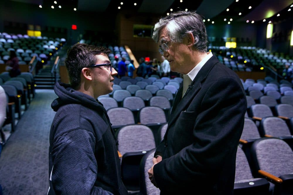 Sophomore C. J. Murphy speaks with Broderick after his presentation. (Jesse Costa/WBUR)