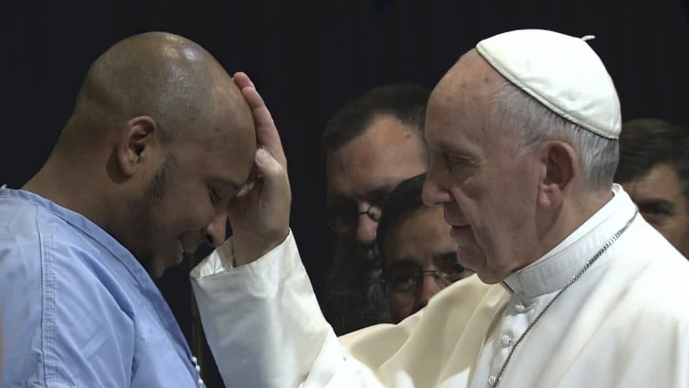 A man in a detention center meets with Pope Francis. (Courtesy Focus Features)