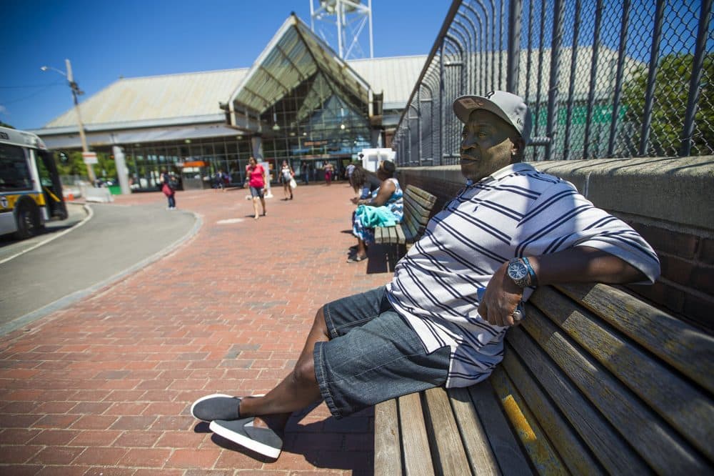 Clarence, 53, seen here by the Forest Hills MBTA station, says he's been addicted to heroin for 30 years. (Jesse Costa/WBUR)