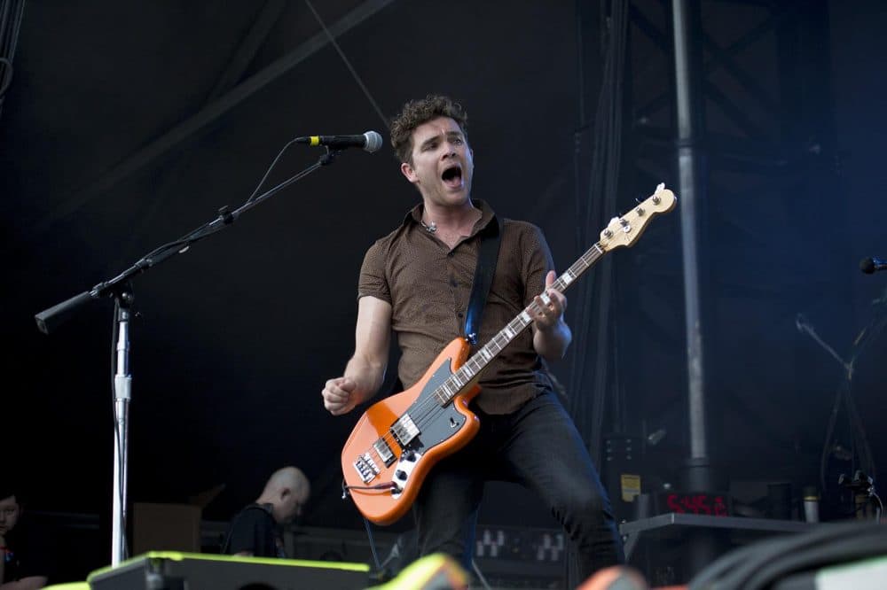 Mike Kerr performs with Royal Blood. (Jesse Costa/WBUR)