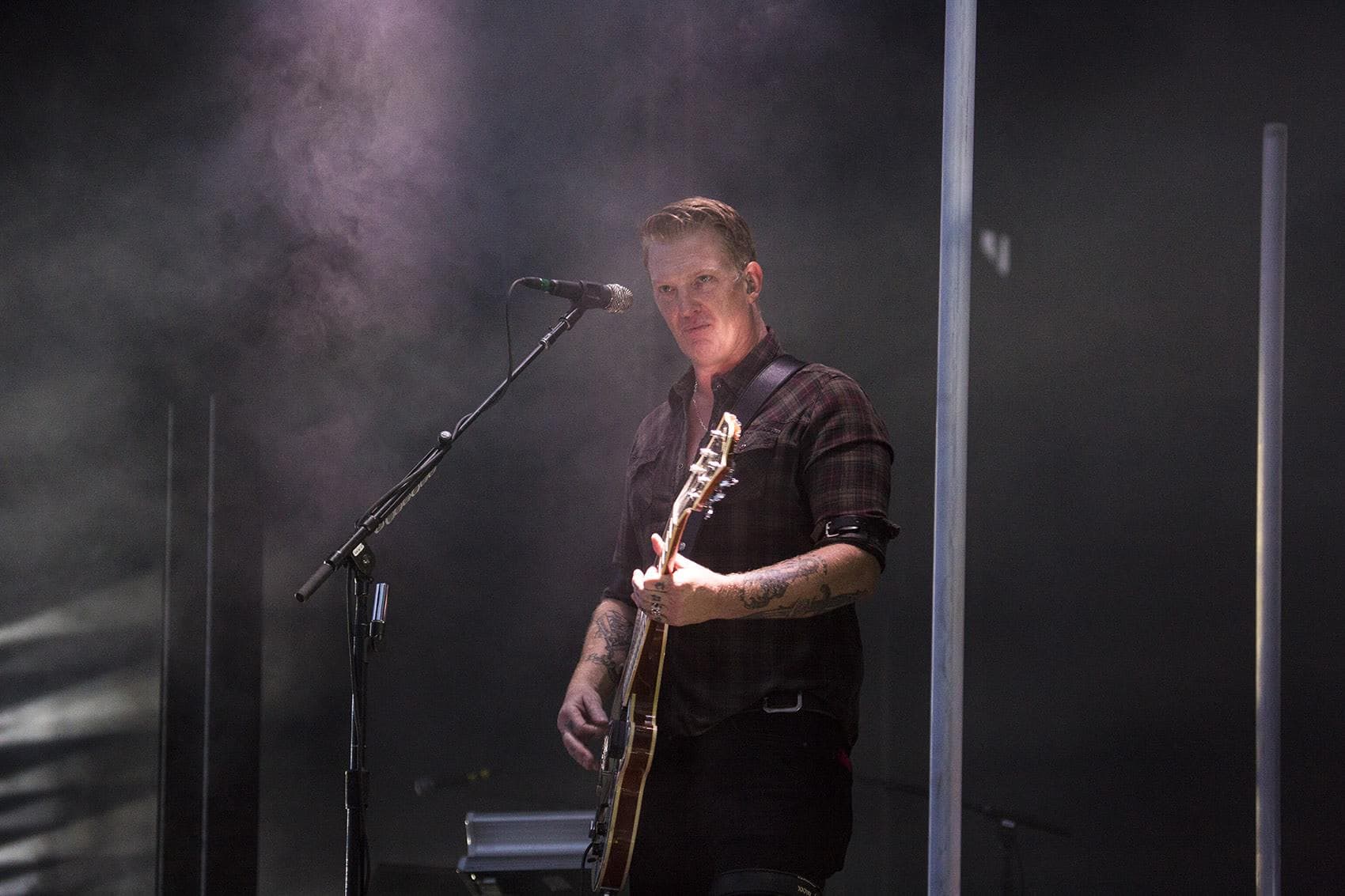 Josh Homme performing with Queens Of The Stone Age. (Jesse Costa/WBUR)