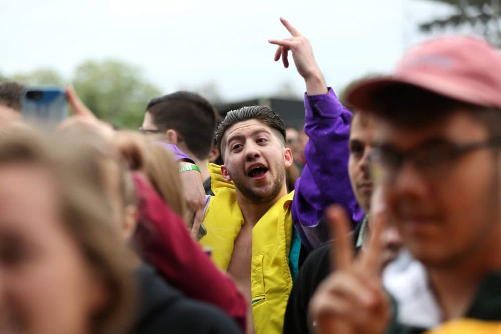 People dance during Boston-based hip-hop duo STL GLD's performance at Boston Calling. (Hadley Green for WBUR)