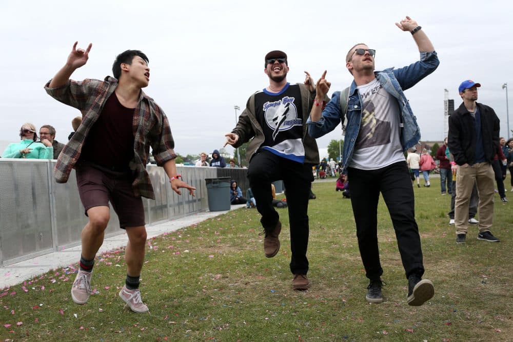 Leo Son, Ryne Steinborn and Austin Allen of Boston dance to Weakened Friends at Boston Calling. (Hadley Green for WBUR)