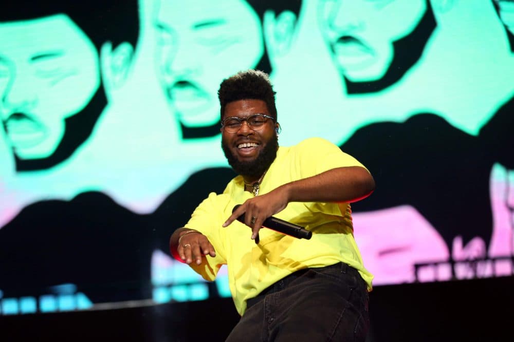 Khalid dances on stage at Boston Calling. (Hadley Green for WBUR)