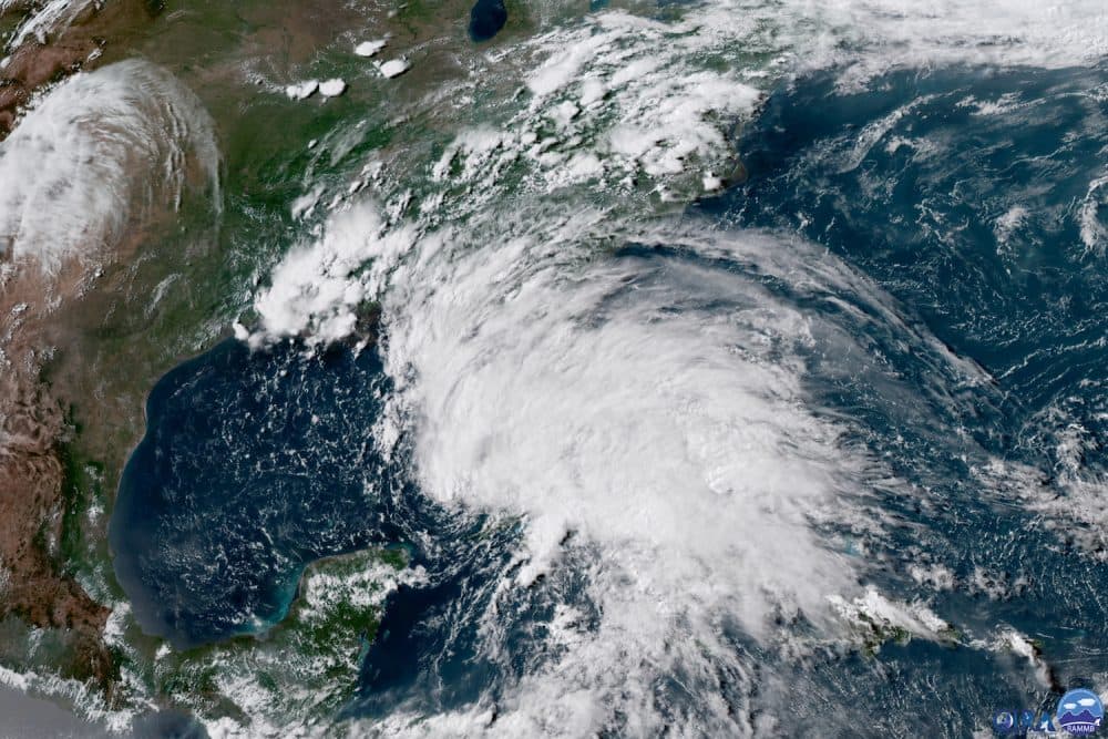 This GOES-16 GeoColor satellite image taken Saturday, May 26, 2018, at 21:30 UTC, and provided by the National Oceanic and Atmospheric Administration (NOAA), shows Subtropical Storm Alberto in the the Gulf of Mexico. (NOAA via AP)