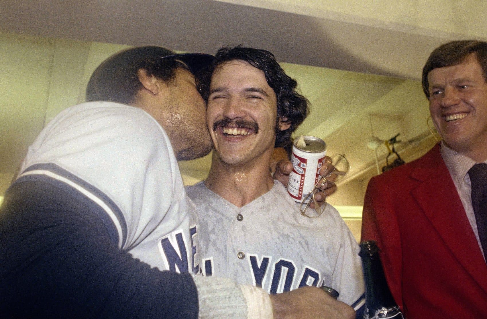 Reggie Jackson kisses Ron Guidry after New York Yankees win the 1978 World Series. (AP)