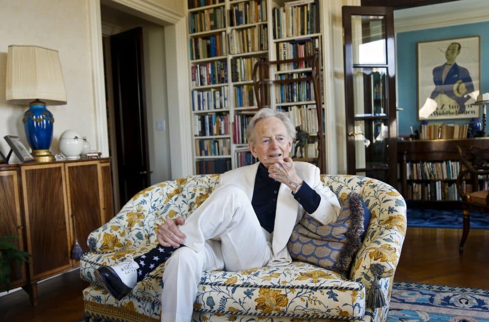 In this July 26, 2016 photo, American author and journalist Tom Wolfe, Jr. appears in his living room during an interview about his book, "The Kingdom of Speech," in New York. (Bebeto Matthews/AP)