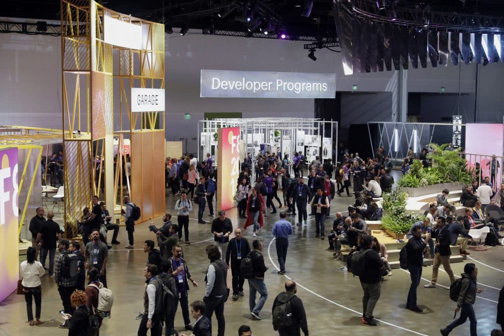 Attendees roam the showroom floor during F8, Facebook's developer conference, Tuesday, May 1, 2018, in San Jose, Calif. (Marcio Jose Sanchez/AP)