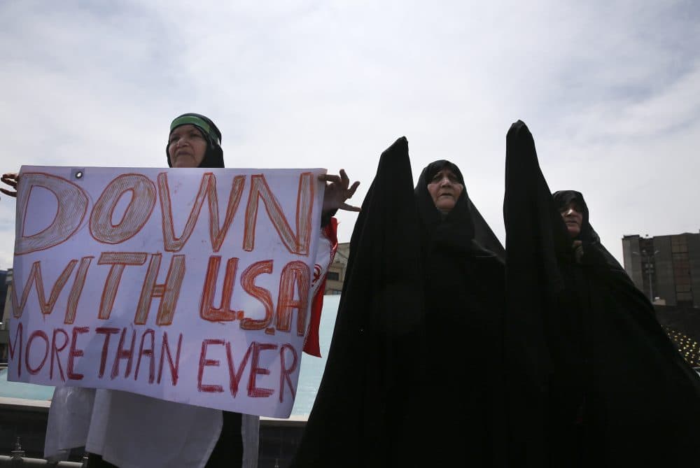 Iranian women attend an anti-U.S. gathering after the Friday prayer in Tehran, Iran, Friday, May 11, 2018. Thousands of Iranians took to the streets in cities across the country to protest U.S. President Donald Trump's decision to pull out of the nuclear deal with world powers. (Vahid Salemi/AP)