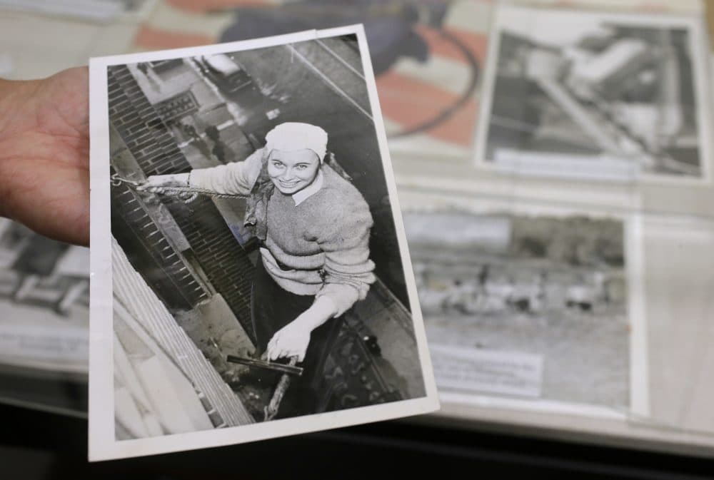 Fern Corbett, 24, working as a window washer 10 floors above a Minneapolis street during World War II. (Steven Senne/AP)