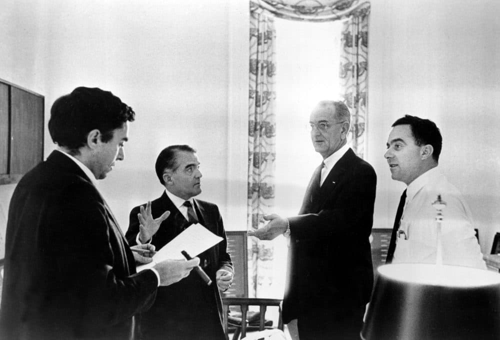 President Lyndon B. Johnson consults with assistants while drafting the State of the Union address in 1966. Goodwin is at left. (The White House/AP)