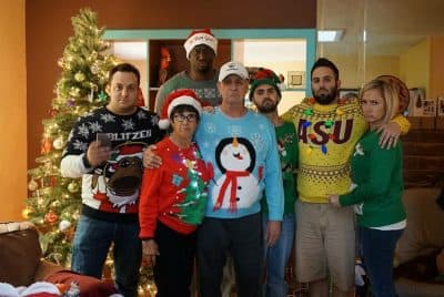 Blondy, the Blitzes, et al. look unhappy, despite their stunning collection of bad Christmas sweaters. (Courtesy Blondy Baruti)