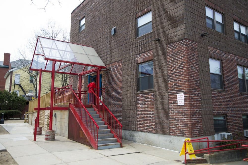 A resident walks into the Casa Esperanza’s men’s program in Roxbury. (Jesse Costa/WBUR)