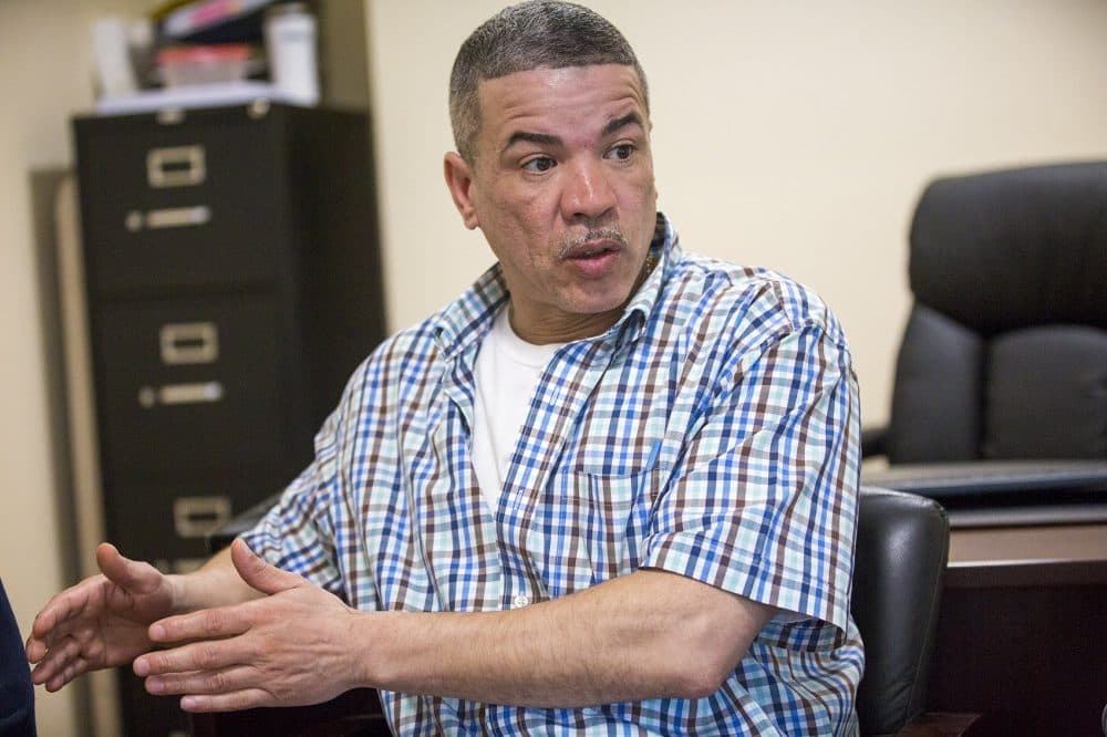 Richard Lopez, a recovery coach, works to get Latino clients into addiction treatment facilities that have at least one translator. (Jesse Costa/WBUR)