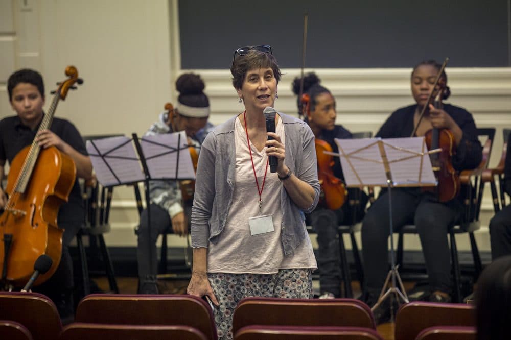 Linda Nathan introduces a group of students from the Conservatory Lab Charter School during a recent conference at the Harvard Graduate School of Education. (Jesse Costa/WBUR)