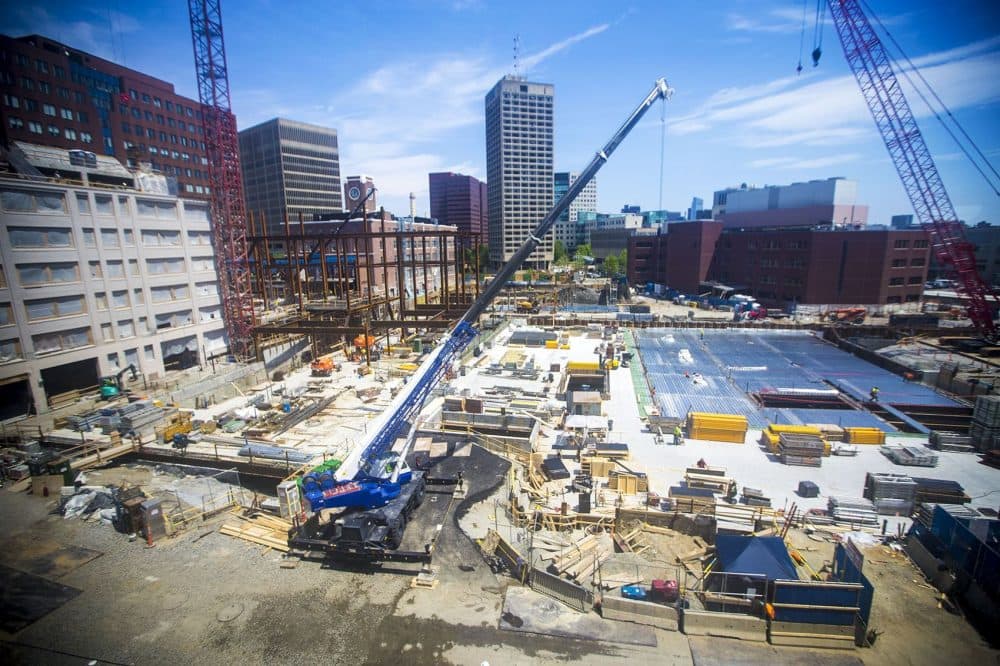This construction site is part of the MIT Kendall Square Initiative. (Jesse Costa/WBUR)