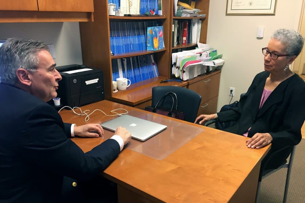 In this Thursday, May 24, 2018 photo, Adine Usher, 78, meets with breast cancer study leader Dr. Joseph Sparano at the Montefiore and Albert Einstein College of Medicine in the Bronx borough of New York. Usher was one of about 10,000 participants in the study which shows women at low or intermediate risk for breast cancer recurrence may safely skip chemotherapy without hurting their chances of survival. (Kathy Young/AP)