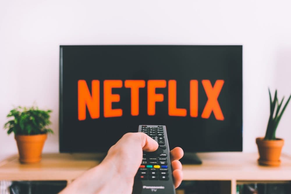 The Netflix logo displayed on a screen. (freestocks/Unsplash)