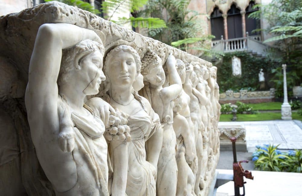 The Farnese Sarcophagus stands at the side of the Isabella Stewart Gardner Museum courtyard before beginning its latest journey to become the centerpiece of the museum's new exhibit. (Robin Lubbock/WBUR)