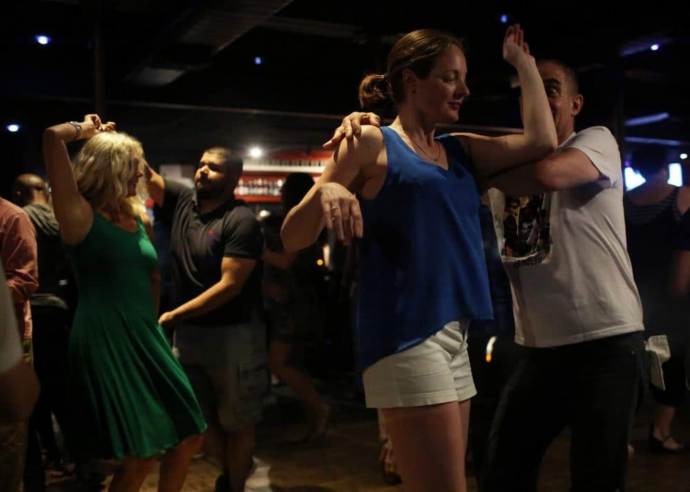 Salsa Sundays bring in everyone from experienced dancers to beginners at Ryles. (Hadley Green for WBUR)