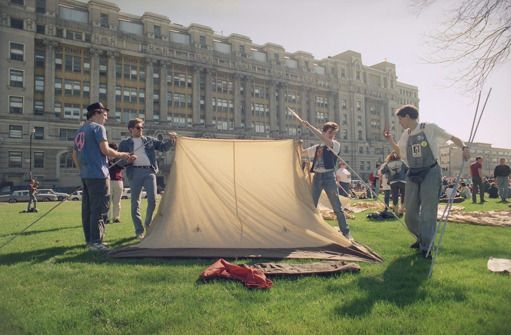 Members of ACT-UP, a group of AIDS activists, erect a tent across the street from Cook County Hospital, April 21, 1990 in Chicago, Ill. (John Swart/AP)