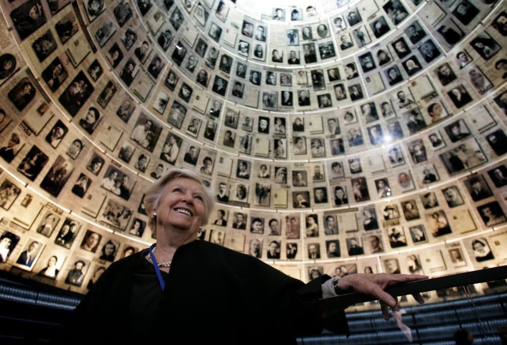 Andree Geulen-Herscovici, who rescued some 300 Jewish children in the Holocaust, looks at photographs of Jews who were killed. Geulen-Herscovici visited the Hall of Names at the Yad Vashem Holocaust Memorial in Jerusalem, Wednesday, April 18, 2007. (Sebastian Scheiner/AP)
