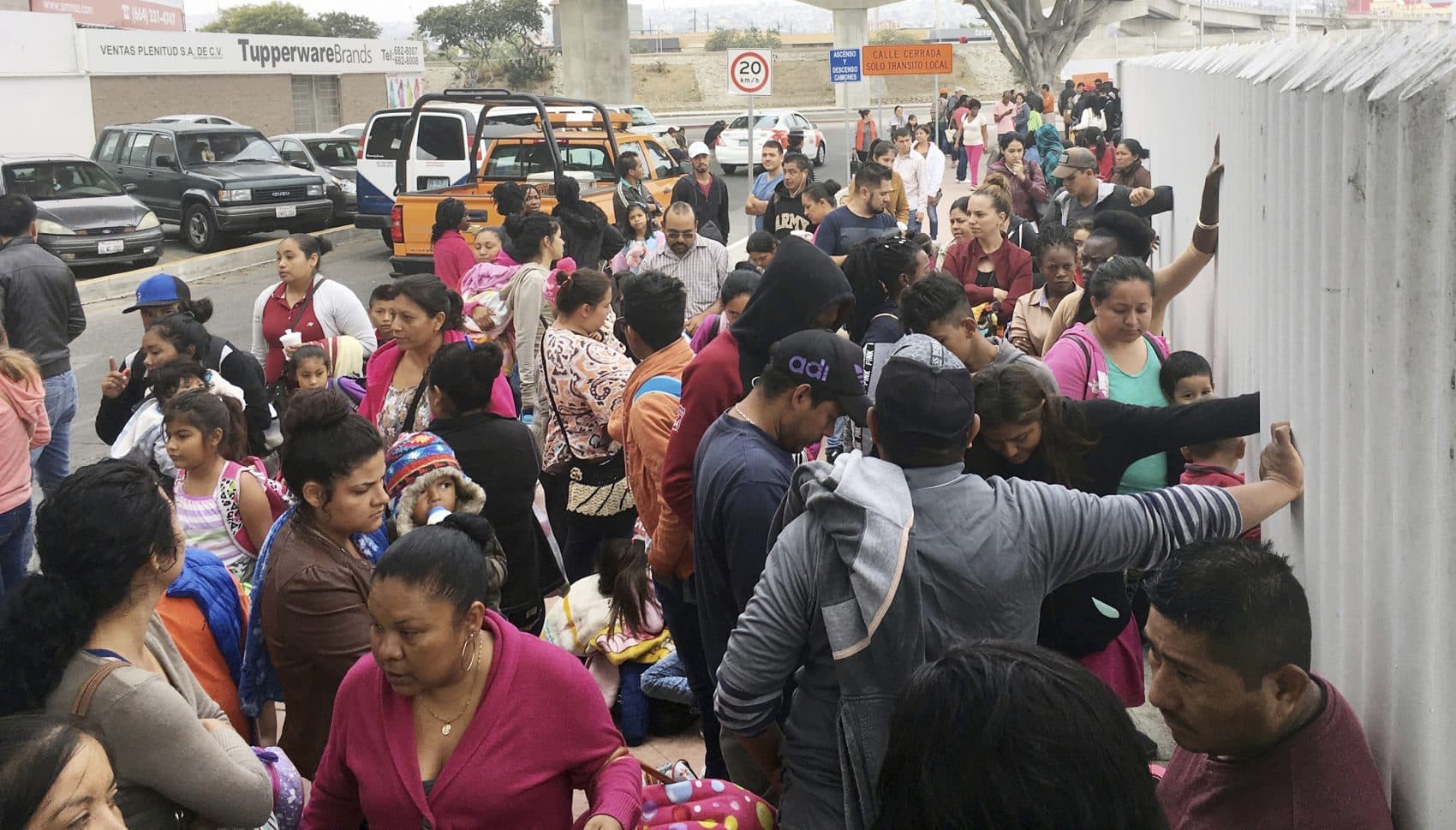 In this Monday, June 4, 2018 file photo, people seeking political asylum in the United States line up to be interviewed in Tijuana, Mexico, just across the U.S. border south of San Diego. Immigration judges generally cannot consider domestic and gang violence as grounds for asylum, U.S. Attorney General Jeff Sessions said Monday, June 11, 2018 in a ruling that could affect large numbers of Central Americans who have increasingly turned to the United States for protection. (Elliot Spagat/AP)