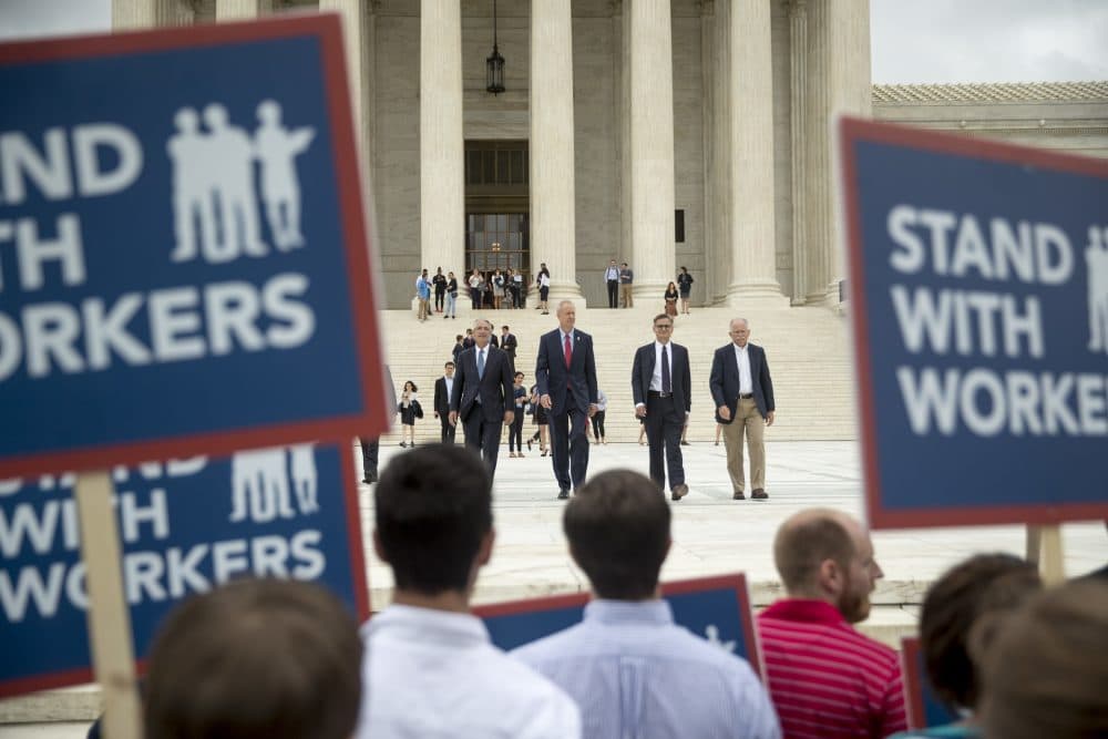 The Supreme Court's ruling Wednesday in Janus is seen as a blow to public sector workers, like teachers. (Andrew Harnik/AP)