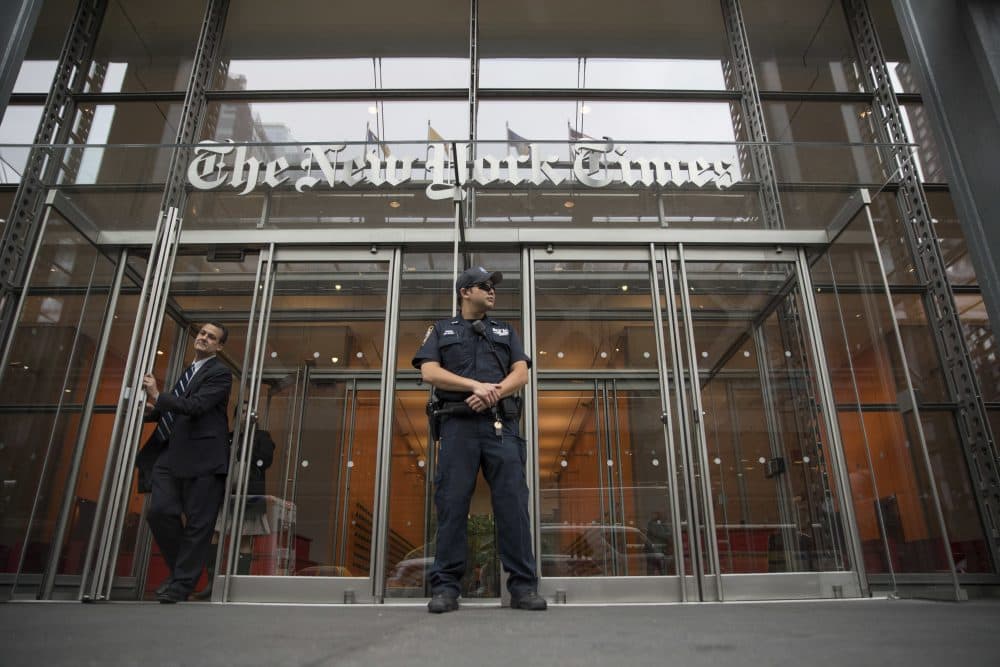 A police officer stands guard outside The New York Times building, Thursday, June 28, 2018, in New York. The New York Police Department has sent patrols to major news media organizations in response to a fatal shooting at a newspaper in Annapolis, Md. (Mary Altaffer/AP)