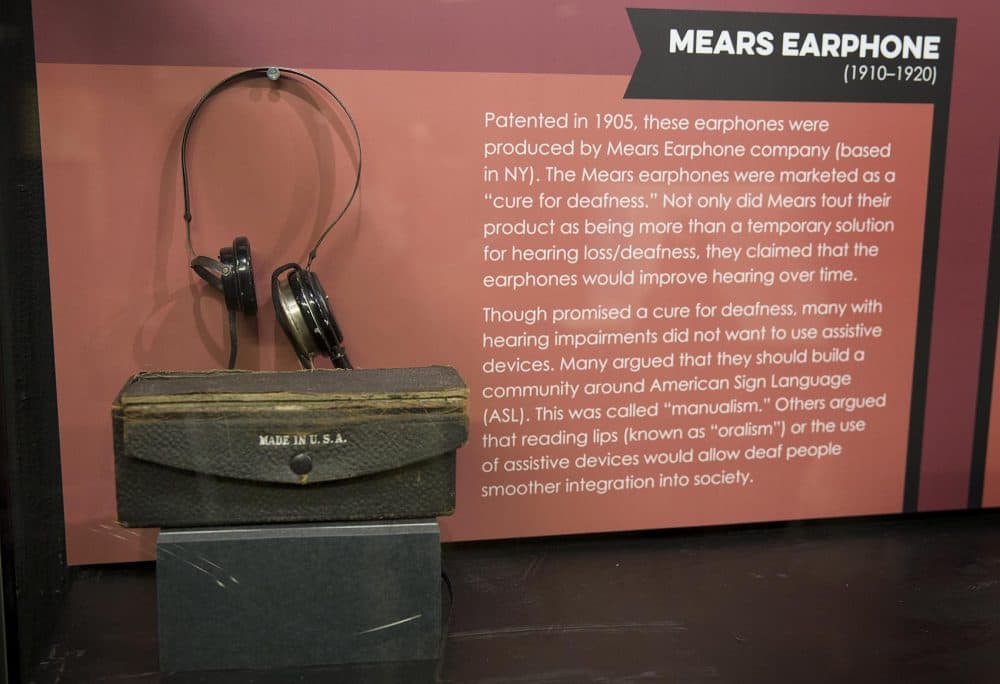 A Mears earphone is included in a part of the exhibit titled &quot;Towards Independence and Inclusion.&quot; (Robin Lubbock/WBUR)